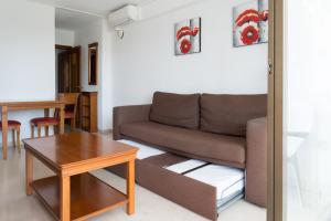 a living room filled with furniture and a couch at Gemelos 2 - Beninter in Benidorm
