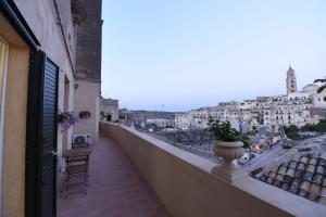 a balcony with a view of a city at Antica Dimora storica La finestra sul campanile in Matera