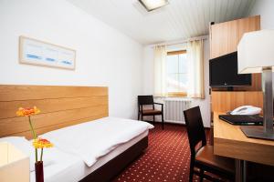 Postel nebo postele na pokoji v ubytování Hotel.Pension.Golingen
