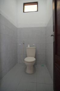 Koupelna v ubytování Puri Itoma Bungalows
