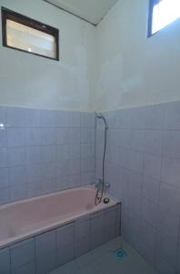 Koupelna v ubytování Puri Itoma Bungalows