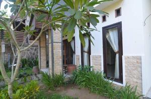 Zahrada ubytování Puri Itoma Bungalows