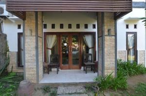 Exteriér nebo vchod ubytování Puri Itoma Bungalows
