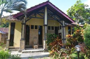 Zahrada ubytování Puri Itoma Bungalows