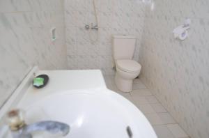 Koupelna v ubytování Puri Itoma Bungalows
