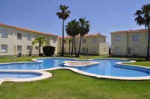 Bazén v ubytovaní Family Beach Club Sevilla II alebo v jeho blízkosti