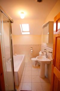 A bathroom at Village Lodge - Carlingford