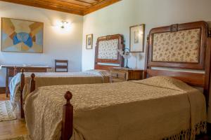 Ένα ή περισσότερα κρεβάτια σε δωμάτιο στο Casa de Pascoaes Historical House
