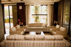 A seating area at Class Hotel Passos