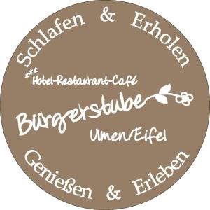 a group of calligraphy words in a circle at Hotel Restaurant Bürgerstube in Ulmen