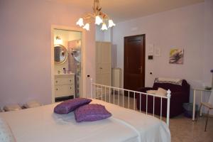 A bed or beds in a room at Bed&Breakfast degli ulivi
