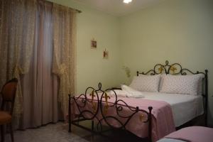 A bed or beds in a room at Bed&Breakfast degli ulivi