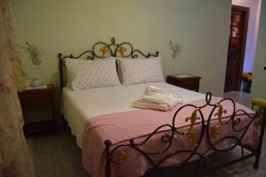A bed or beds in a room at Bed&Breakfast degli ulivi