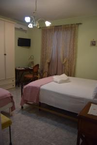 A bed or beds in a room at Bed&Breakfast degli ulivi