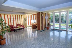 Svetainės erdvė apgyvendinimo įstaigoje Hotel Scala