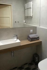 Ett badrum på Florianska Apartment
