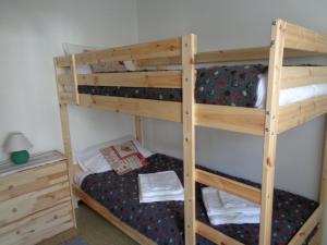 Un ou plusieurs lits superposés dans un hébergement de l'établissement Casa Elvis La Thuile
