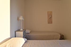 Posteľ alebo postele v izbe v ubytovaní Olive Tree House in Parikia