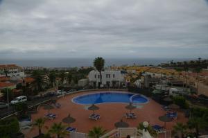 an aerial view of a resort with a swimming pool at Sunny Apartment Colina Blanca in Adeje