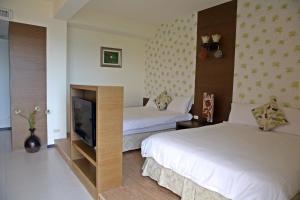 Postel nebo postele na pokoji v ubytování La View 麗晨 Homestay