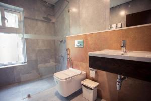 Vonios kambarys apgyvendinimo įstaigoje Crayons Guest House Munnar