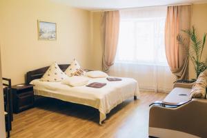 a hotel room with two beds and a window at Berizka in Perechin