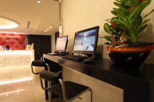 TV a/nebo společenská místnost v ubytování Ximen Citizen Hotel