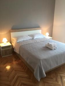 Cama ou camas em um quarto em Apartments Granzola
