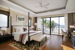 Ein Bett oder Betten in einem Zimmer der Unterkunft Vinpearl Resort Nha Trang