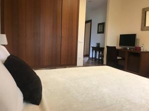 Ein Bett oder Betten in einem Zimmer der Unterkunft Mas Duc