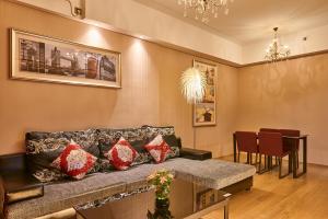 Heefun International Apartment - Zhujiang New Town FuLi Brand New World Plaza的休息区