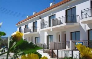a building with balconies on the side of it at Siblings Nest 1 in Polis Chrysochous