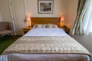 Ένα ή περισσότερα κρεβάτια σε δωμάτιο στο A Park View Hotel