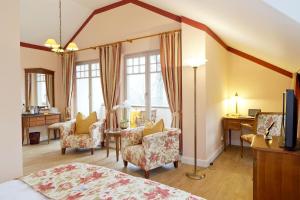 Postel nebo postele na pokoji v ubytování Hotel Villa Monte Vino