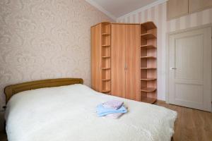 Postel nebo postele na pokoji v ubytování Nadezhda Apartments on Jeltoksan 103 + 11 fotografií