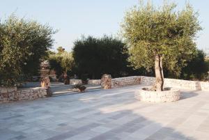 Κήπος έξω από το Trulli a Sud-Est