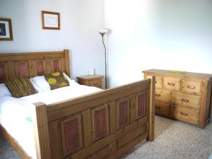 A bed or beds in a room at Il Monte Farmhouse