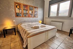 Postel nebo postele na pokoji v ubytování La Chiocciola Guesthouse Briantea