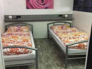 Ένα ή περισσότερα κρεβάτια σε δωμάτιο στο Haus Elvira
