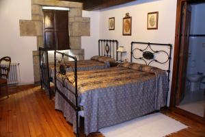 Tempat tidur dalam kamar di Casa Vixide