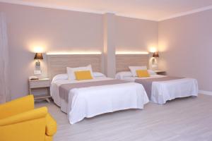 
Cama o camas de una habitación en Hotel Villa de Verín
