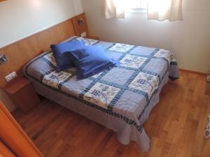 A bed or beds in a room at Cathares Holidays