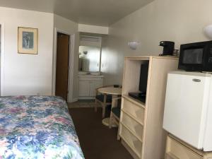 Kuchyň nebo kuchyňský kout v ubytování Point 1 Resort & Motel