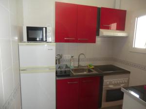 Kuchyň nebo kuchyňský kout v ubytování Casas Holiday - playa Acequion