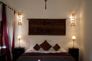Ένα ή περισσότερα κρεβάτια σε δωμάτιο στο Dar Rocmarra