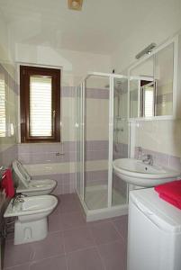 Koupelna v ubytování Giardino sul mare + 40 fotografií