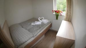 Posteľ alebo postele v izbe v ubytovaní Všemina Apartman