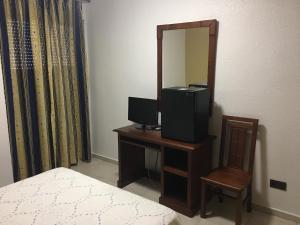 TV a/nebo společenská místnost v ubytování Hotel La Parra