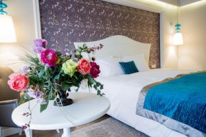 Postelja oz. postelje v sobi nastanitve Hotel Dragului