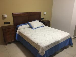 Postel nebo postele na pokoji v ubytování Hotel La Parra + 9 fotografií